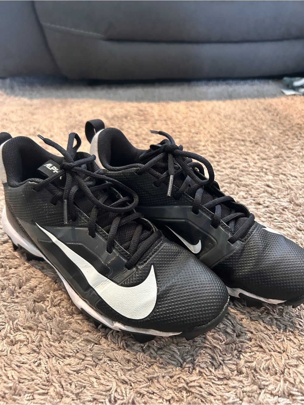 Nike Black football Cleats with White Swoosh